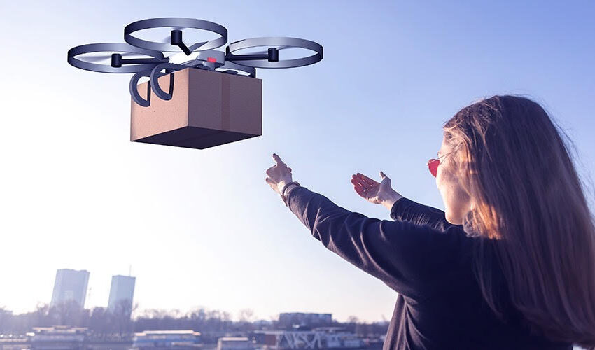 image of woman receiving drone delivery package